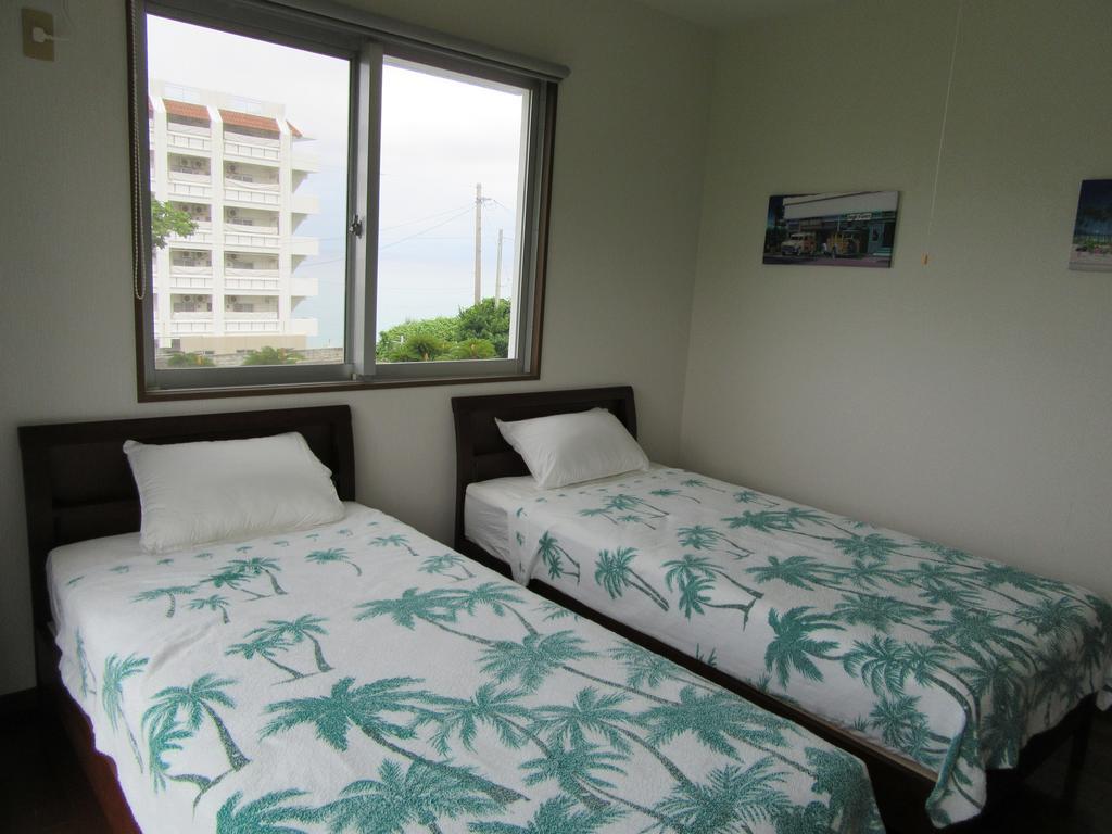 Guest House Diamond Йомитан Экстерьер фото